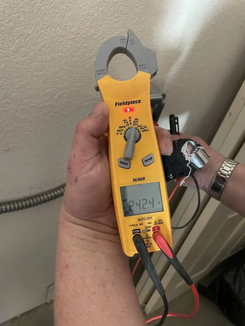 Voltage testing with clamp meter during Electrical Installation Services in Lake Wylie